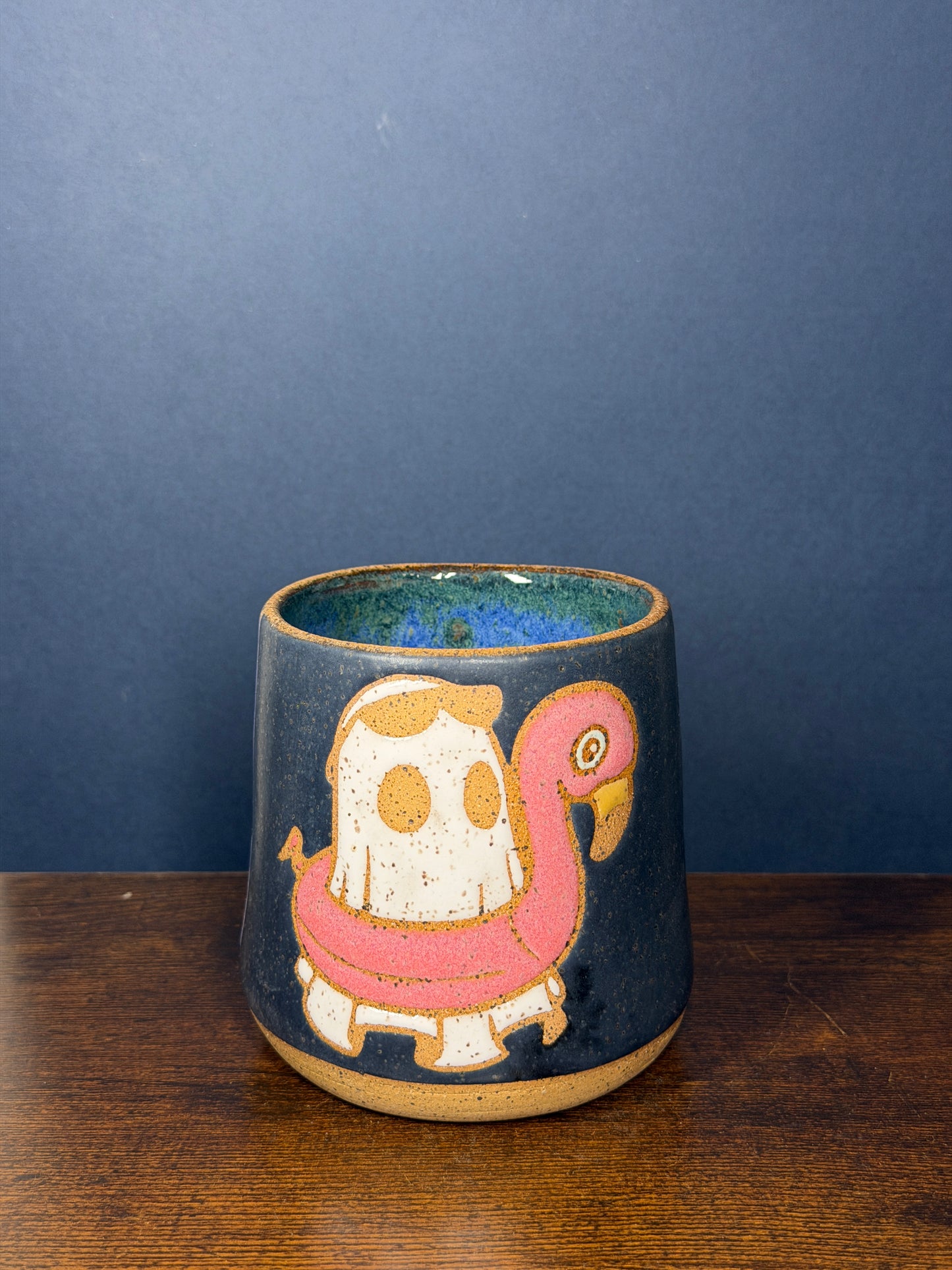 Ghost on flamingo floaty 1