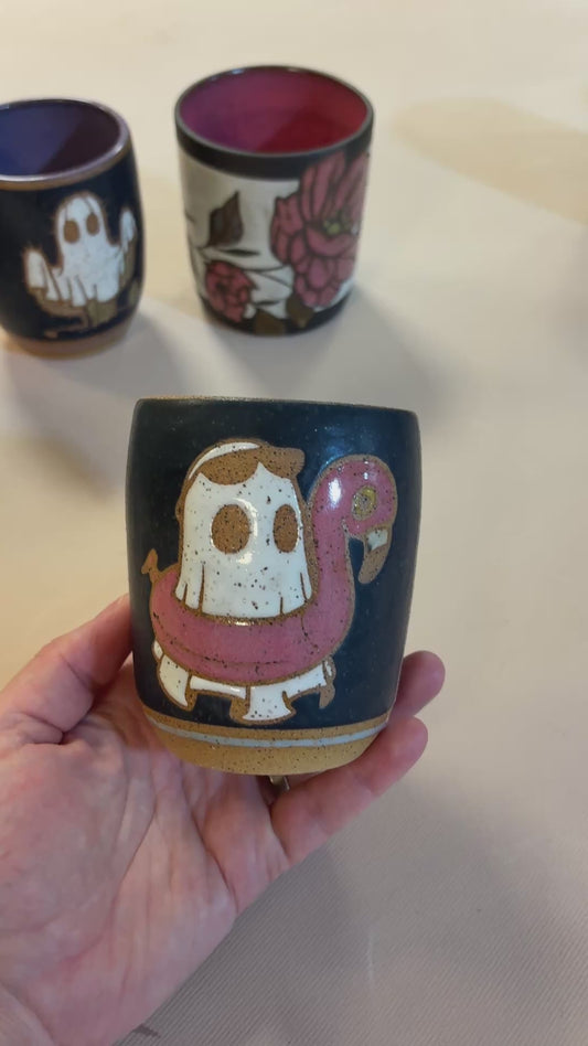 Ghost on flamingo floaty